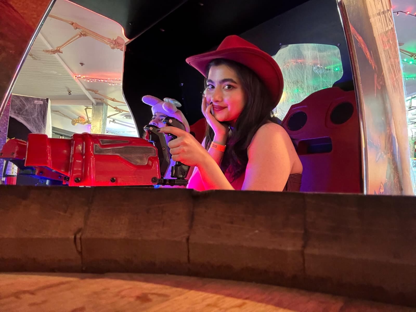 girl wearing red dress and red hat